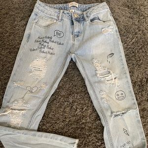ripped design jeans
